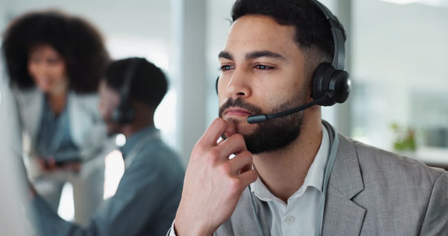 Call center, face or man speaking on headset, telemarketing or telecom office for online customer service. Microphone, computer or sales agent in tech support help desk for consulting, crm or talking