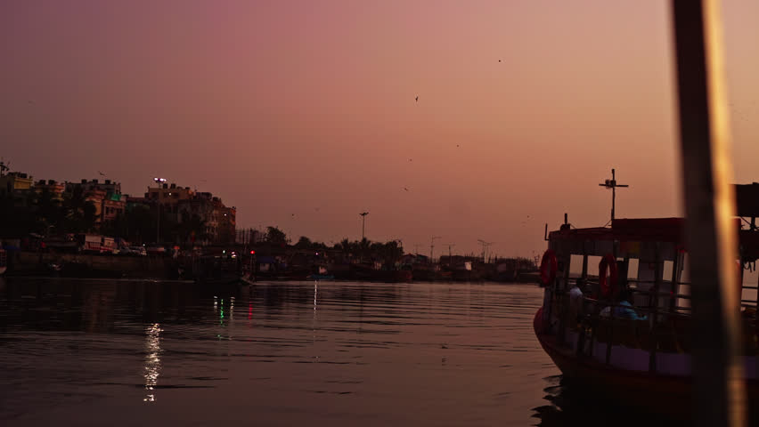  A Boat leaving the Dockyard During Sunset