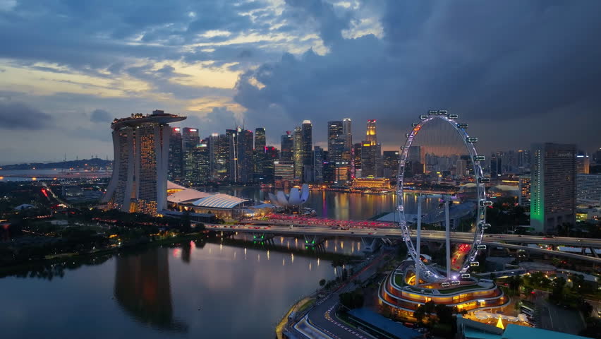 Aerial view of Singapore city at night.