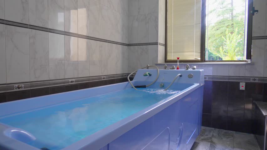 Hot springs, geothermal water in modern rodon baths in Tskhaltubo, Georgia. State-of-the-art hot geothermal water bath.