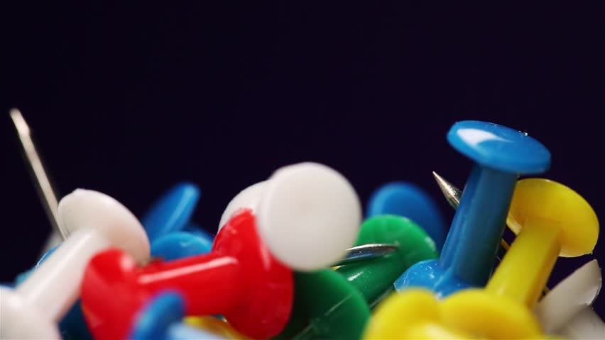 Close-up of Multi Colored push pins. Office and school stationery concept Royalty-Free Stock Footage #1109030133