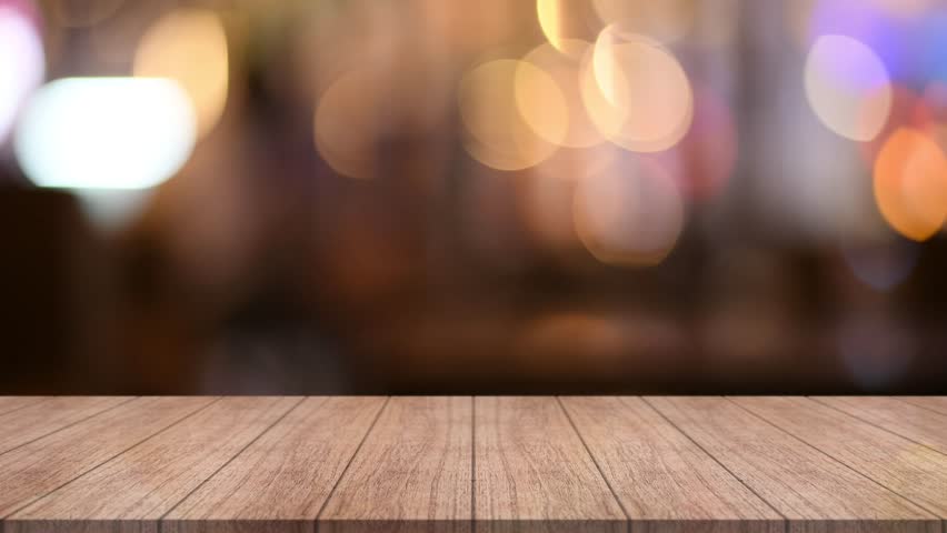 Empty wooden table top with lights bokeh on blur restaurant background.	
 Royalty-Free Stock Footage #1109034941