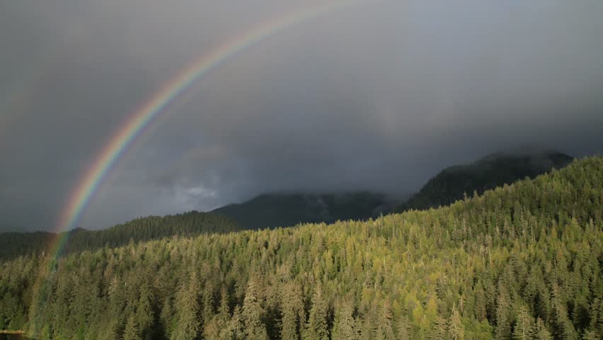 Rainbow and lake reveal in Ketchikan Alaska in the Tongass National Forest