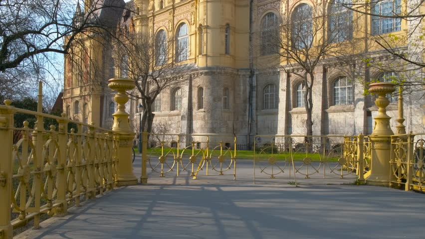 Varosliget historical place. A view of ancient vajdahunyad castle between nature in the park in Budapest.