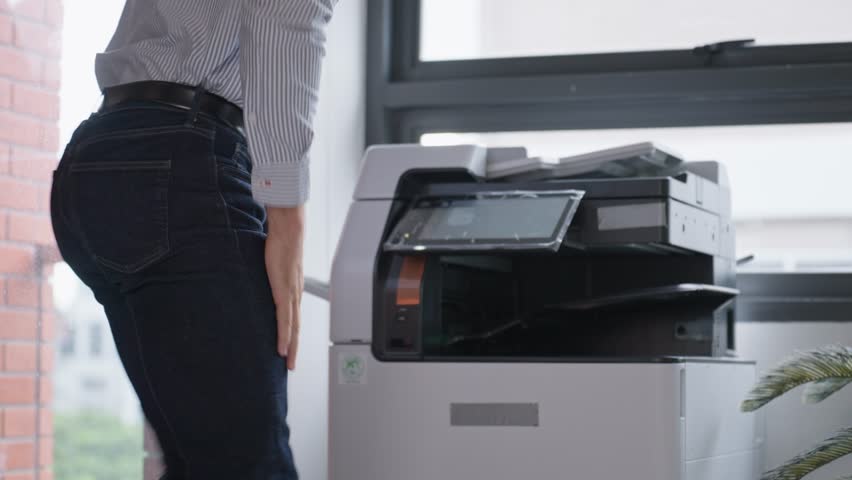 Businesswoman panic because a photocopy machine was broken. Paper stuck in printer at office. Photocopy machine was broken. Photocopier or printer has error Royalty-Free Stock Footage #1109058251