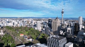 Auckland, New Zealand: Aerial drone footage of Auckland downtown district skyline and the Albert park in New Zealand largest city, shot with a rotation motion. 