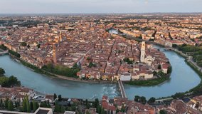 Aerial view of Verona, Italy, Ponte Pietra Over Adige river, Historic City Centre, Cathedral, Duomo, Red Roofscapes, Veneto Region
