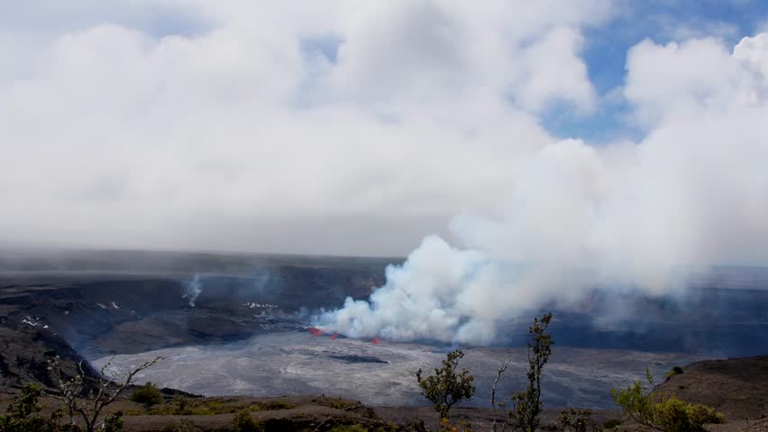 Kilauea Crater Eruption September 11 viewed from the west with cooling lava lake with crust and several fountains day 2 of the eruption.