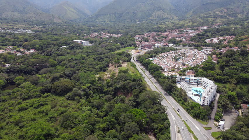 Aerial video over the road that leads from Medellín to Santa Fe de Antioquia, in areas that belong to the municipality of San Jeronimo