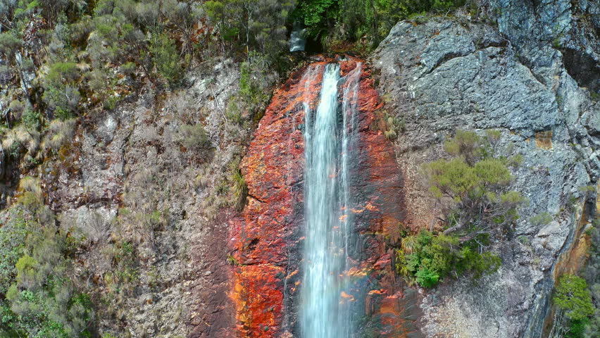Tall waterfall in Tasmania Australia. Montezuma falls in nature reserve park Royalty-Free Stock Footage #1109081029