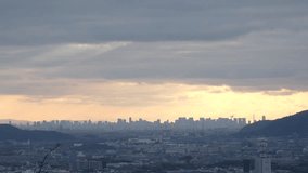OSAKA, JAPAN - DECEMBER 2021 : Aerial panoramic view of downtown buildings at Osaka city in sunset time. View from Kyoto city. Time lapse shot in dusk. Japanese urban city concept video.