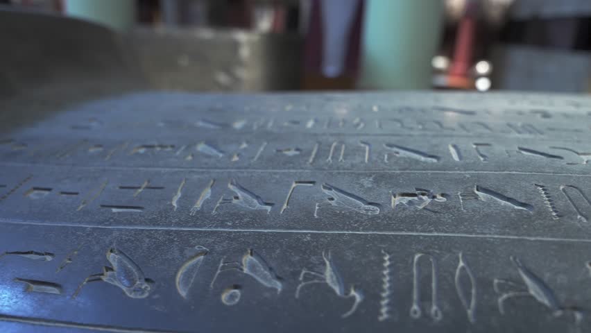 Close up slider shot of egyptian hieroglyphs on the stone tomb of the pharaoh in The Museum in Cairo. Heritage of ancient civilization in archaeological excavation Royalty-Free Stock Footage #1109081329