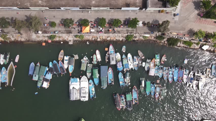 Aerial Birds Eye View Flying Over Marina At Cheung Chau Island In Hong Kong City. Dolly Left Shot