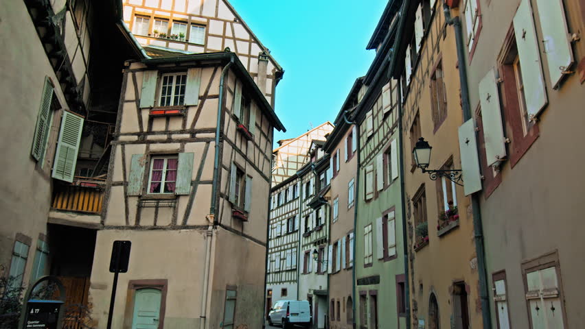 Traditional colourful wooden timbered houses in Colmar the Grand Est of France. Beautiful Renaissance medieval buildings with Cobblestone streets bordering Germany