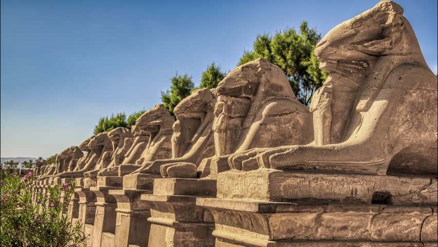 Avenue of ram-headed sphinxes in front of Karnak Temple location Luxor, Egypt Royalty-Free Stock Footage #1109084049