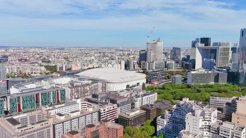 PARIS, FRANCE, EUROPE: Aerial view of  La Défense Arena, multi-purpose indoor sports arena and concert hall, venue of Olympic Summer Games 2024.
 Royalty-Free Stock Footage #1109086673