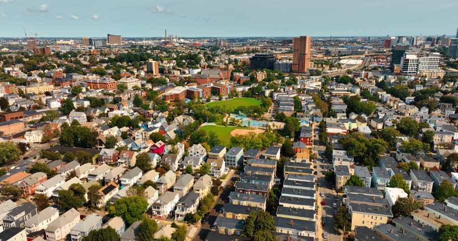 Densely built low-rise architecture of the city on sunny day. Cityscape of Cambridge, Massachusetts, USA from bird