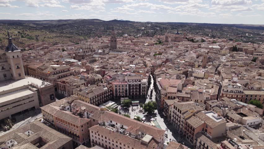 Plaza de Zocodover in Toledo Spain, aerial arc cityscape shot
