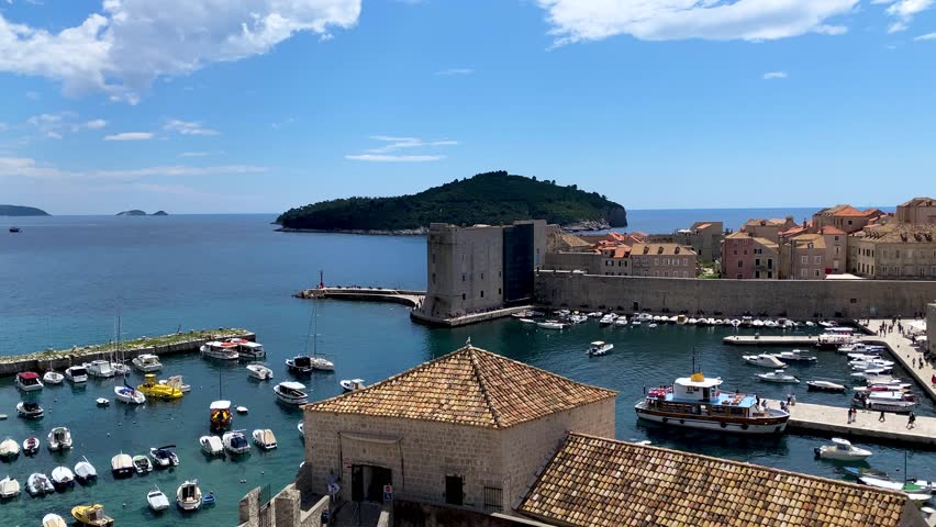 Dubrovnik a city in southern Croatia fronting the Adriatic Sea, Europe. Old city center of famous town Dubrovnik, Croatia. Picturesque view on Dubrovnik old town (medieval Ragusa) and Dalmatian Coast.
