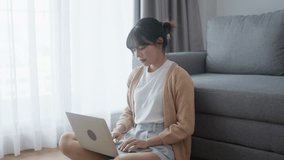 Young asian student learning lesson online and studying from home. online education

