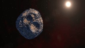 Asteroid Psyche. Asteroid orbiting the Sun between Mars and Jupiter. Psyche mission. Large metallic asteroid. This video elements furnished by NASA.