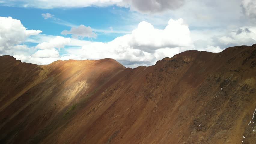 Aerial reveal off of Mount Baldy to Elk Mountain Range in Crested Butte Colorado