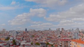 Timelapse: fast moving white clouds in the blue sky over typical turkish apartment, residential buildings in Istanbul - afternoon, daylight. Cityscape, oriental, architecture and time lapse concept - Powered by Shutterstock - Get 15% off with code: PIKWIZARD15