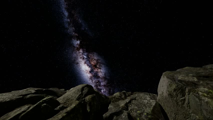 4K Astrophotography star trails over sandstone canyon walls. Elements of this image furnished by NASA