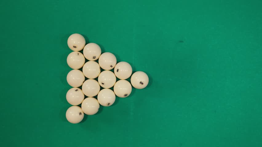 A young man plays American billiards. Russian billiards, an American in a billiards club and bar. Dark colors in the billiard club. A man pockets snooker balls. | Shutterstock HD Video #1109109835