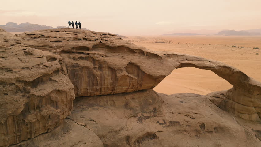 Aerial shot, drone shot, Desert landscapes, Bedouin culture, Filming location, Mountainous terrain, Wadi Rum, Wadi Musa, Petra, Amman, Dana, Hiking adventure, Rugged trails, Natural beauty