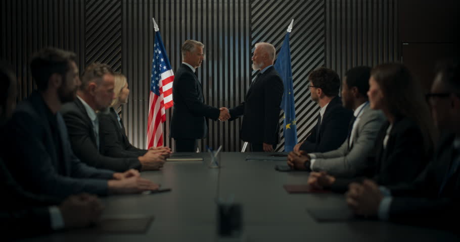 High-Level Political Forum: Two Caucasian Male Politicians From United States And European Union Greeting Each Other With Handshake. Beginning Of Meeting Between World Leaders With Diverse Delegations