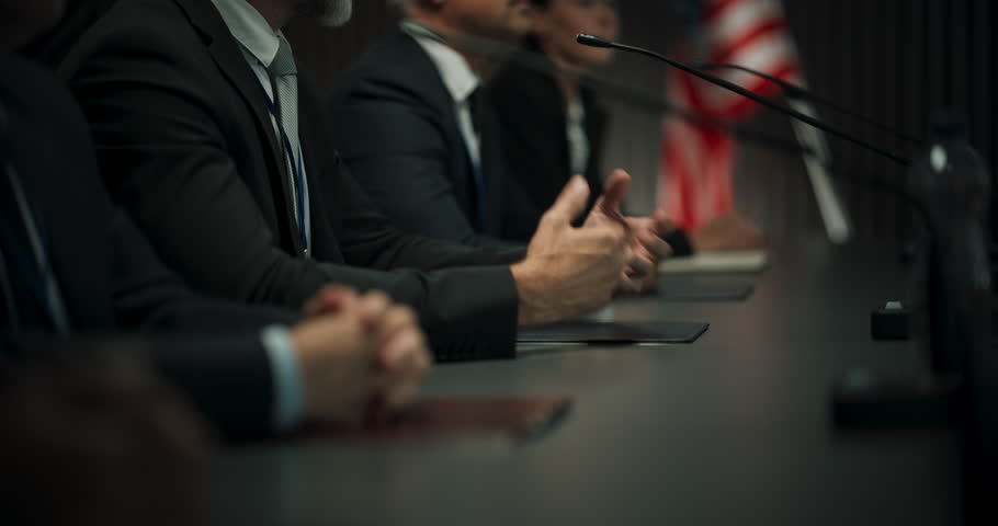 Close Up On Hands of Caucasian Male Organization Representative Speaking at Economic Conference. Head Of USA Delegation Delivering Speech at International Political Summit, Delegates Listening. Royalty-Free Stock Footage #1109116037