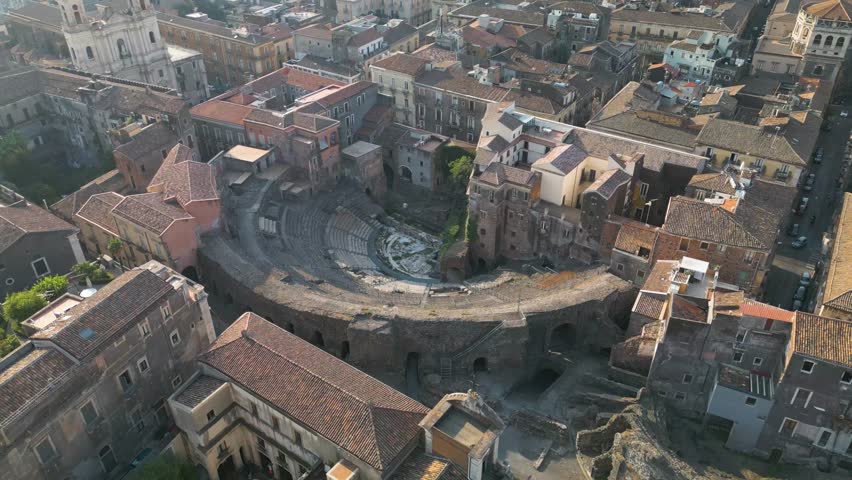 Drone Orbits Above Anicent Roman Theatre in Historic Sicilian City of Catania