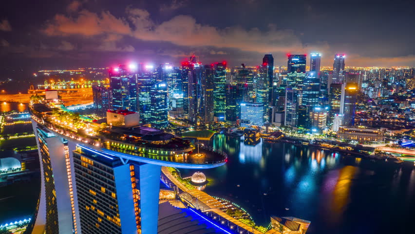 Aerial view of Singapore city at night.