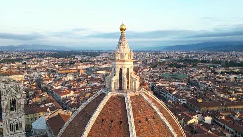 Aerial close view of the Florence Cathedral (Duomo di Firenze) at sunrise, Tuscany, Italy Royalty-Free Stock Footage #1109120179