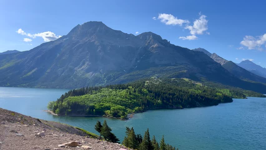 Panning left on the Waterton Lake view from the Prince of Wales Hotel at Waterton Lake National Park in Waterton Park, AB Canada.