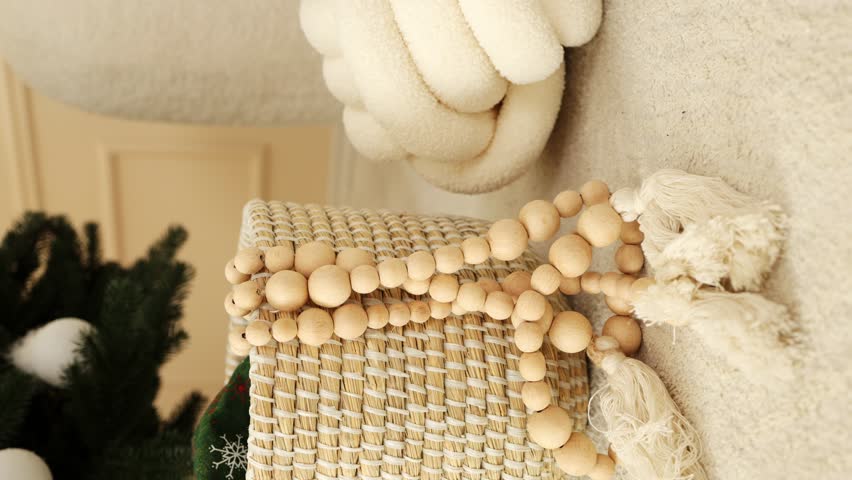 Decor, pillow, wooden garland, home coziness, coziness, home vibe, home textiles. New Year's decor. vertical video | Shutterstock HD Video #1109122953
