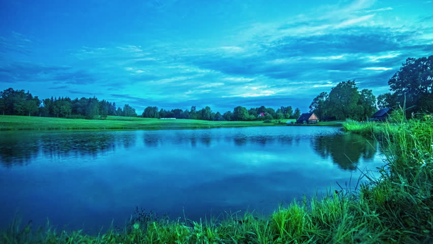 Timelapse of a countryside landscape with amazing colorful changing sky