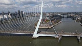 Aerial footage of the famous Erasmus Bridge with the Rotterdam skyline in the background.