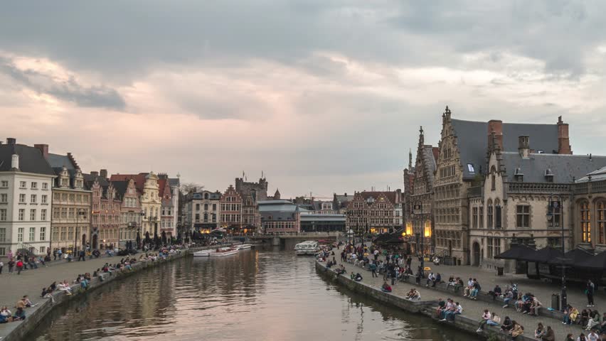 Ghent Belgium time lapse 4K, city skyline day to night timelapse at St Michael