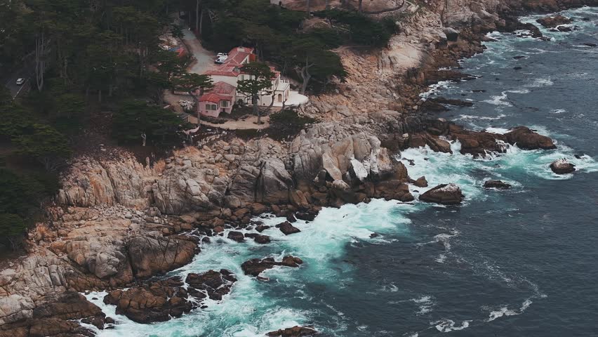 Pacific ocean coast by the California, USA. Huge waves hitting the coastline. Californian beach.