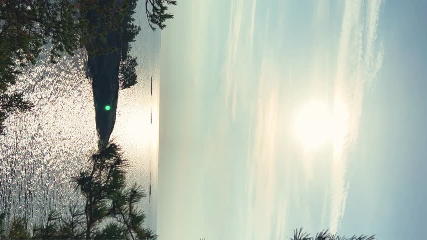 Russia, Karelia, Lake Ladoga, Koyonsaari. View of the coast of the island in a cold lake. Beautiful nature of the Republic of Karelia. Stunning panoramic view of the Ladoga Skerry Islands. 4K