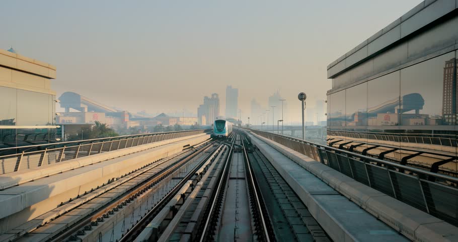 monorail Metro In Dubai, United Arab Emirates. FPV POV At Fast Speed Drive Motion. driverless metro. futuristic city skyline in UAE.street motion Dubai Subway Tunnel. Royalty-Free Stock Footage #1109156629