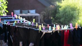 Water vapor evaporation from wet laundry in the sunlight. - Powered by Shutterstock - Get 15% off with code: PIKWIZARD15