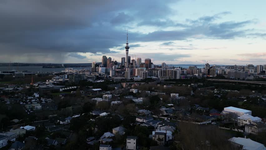 Auckland, New Zealand: Aerial drone footage of Auckland downtown district skyline view from Ponsonby residential district in New Zealand largest city. 