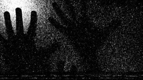 Silhouette of a men's hands on glass scratching and static tv black and white noise, scary movie tv screen noise - Powered by Shutterstock - Get 15% off with code: PIKWIZARD15