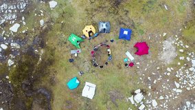Aerial drone footage of fun videos of a group of friends camping.