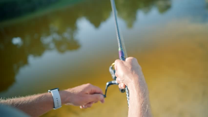 Fisherman catching fish on river | Shutterstock HD Video #1109183395