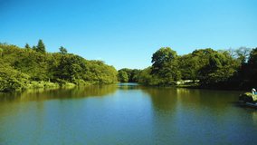 The park and lake spread out under a blue summer sky. Scenery of Kichijoji, Tokyo.