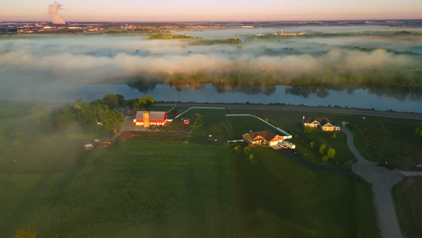 Breathtaking scenic foggy river at dawn, Autumn aerial view.
